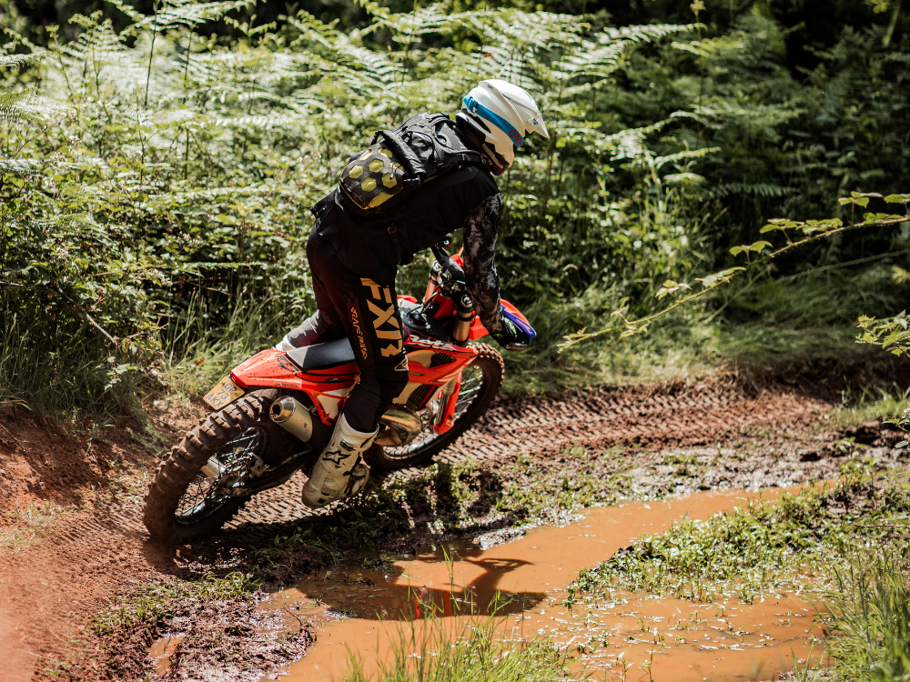 Off-road training day at Machinehead Moto — riders exploring woodland trails