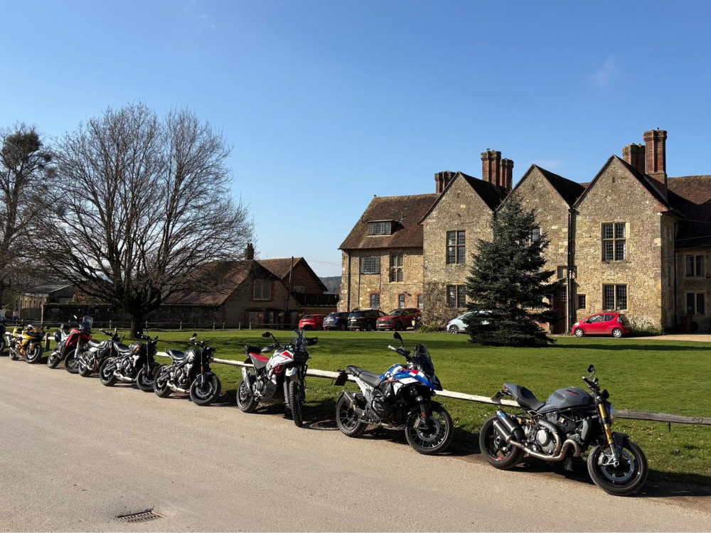 Scenic ride-out through the Surrey Hills — group of bikes heading into the countryside