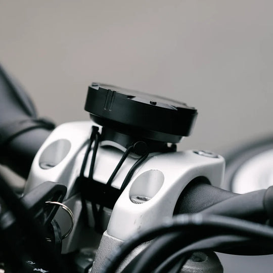 Beeline Moto II motorcycle navigation device side view mounted on handlebars with compact design