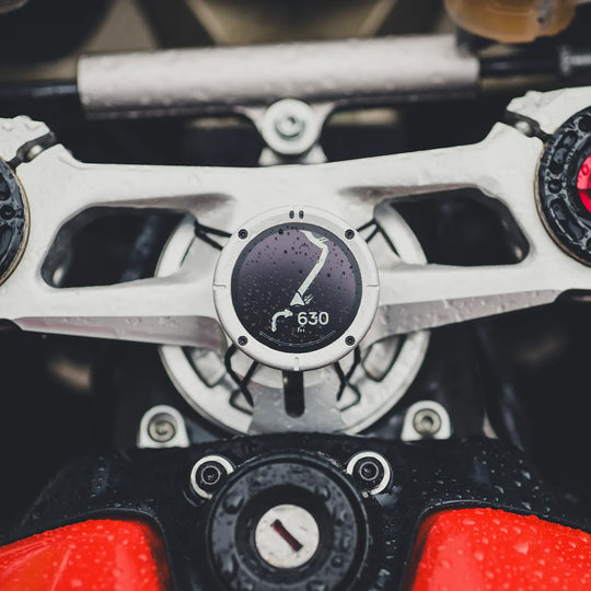 Beeline Moto II Silver waterproof motorcycle GPS showing winding route navigation in 630 metres