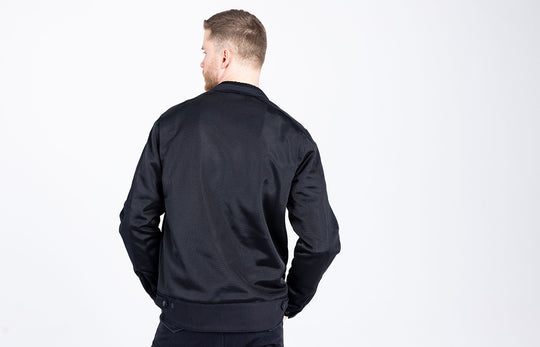 Back view of the John Doe Aero Mesh Jacket in black – breathable CE-certified motorcycle jacket