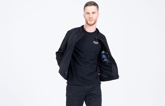 Model revealing inside lining of John Doe Aero Mesh Jacket – black AAA rated mesh motorcycle jacket