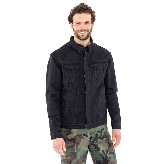 Man smiling in the John Doe Maverick jacket in Black Raw denim with John Doe camo Defender trousers – front view