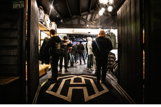 Inside the Machinehead Moto 1 Big Bash marquee filled with riders and live music lighting