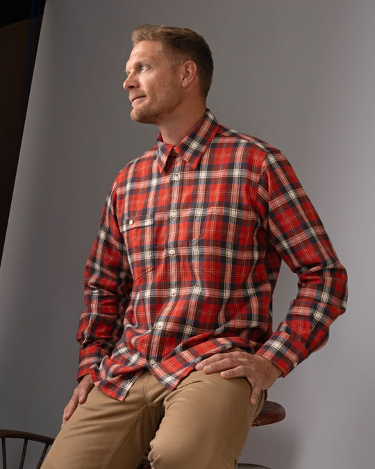 Pike Brothers 1937 Roamer Shirt in Red Flannel shown in a seated pose