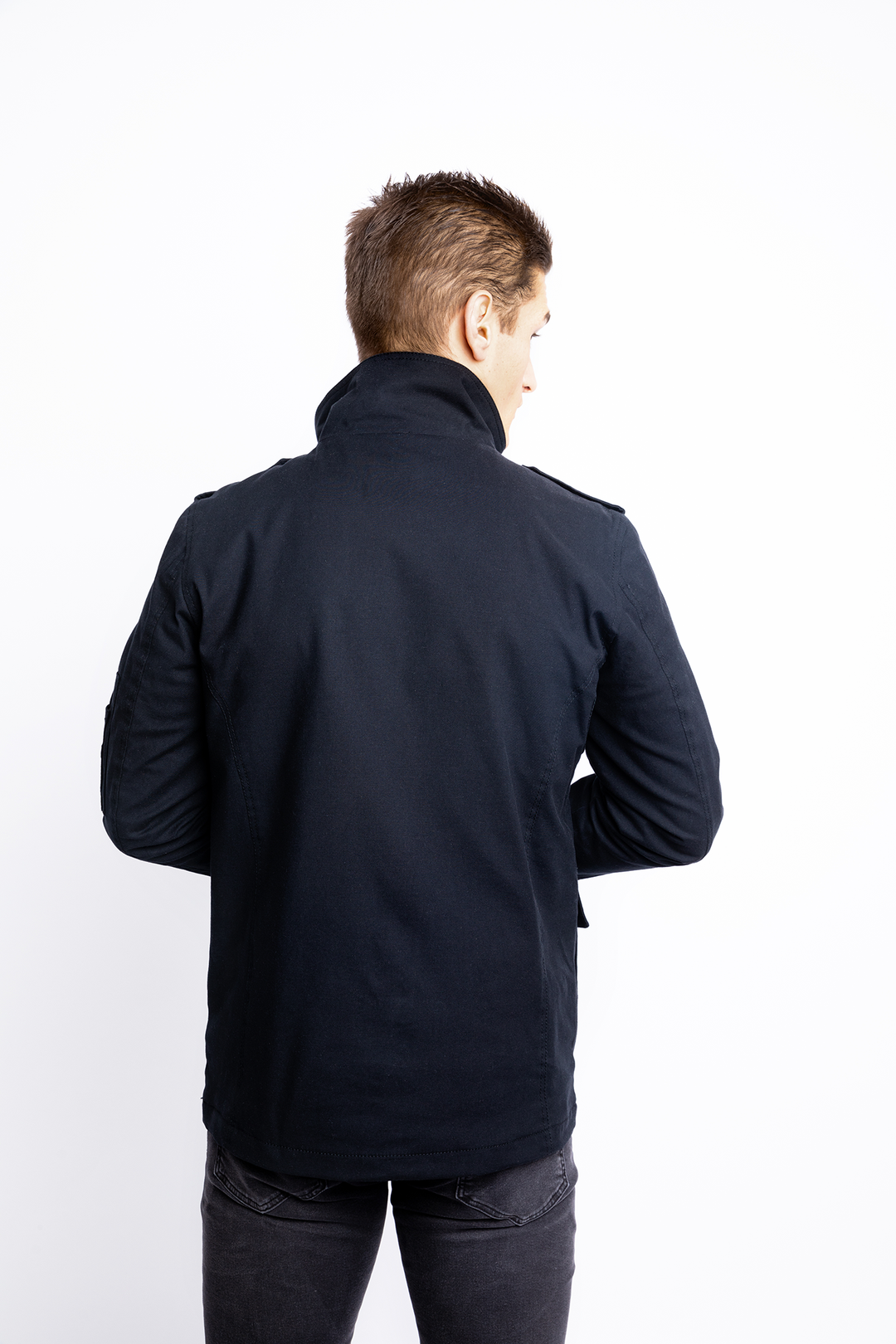 Model-Wearing-John-Doe-Explorer-Jacket-Black-Rear-Collar-up