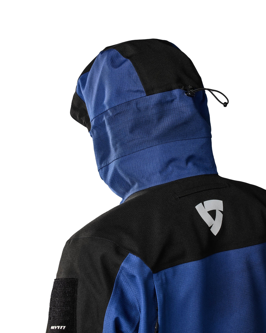 Model wearing REV’IT! Tectonic H2O Jacket, Rear hood view
