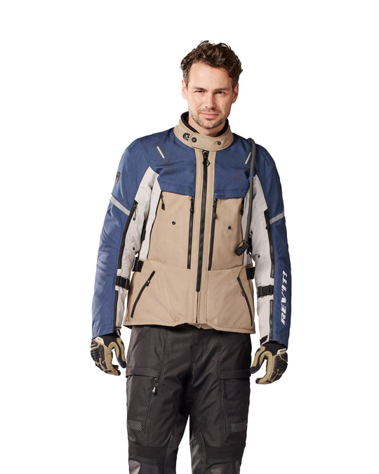 Front view of model wearing REV’IT! Sand 5 H2O Jacket, Sand-Blue