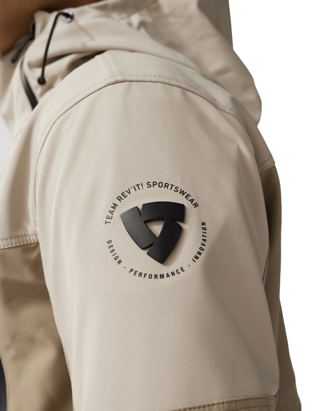Close-up of logo on REV’IT! Altair H2O Smock, sand