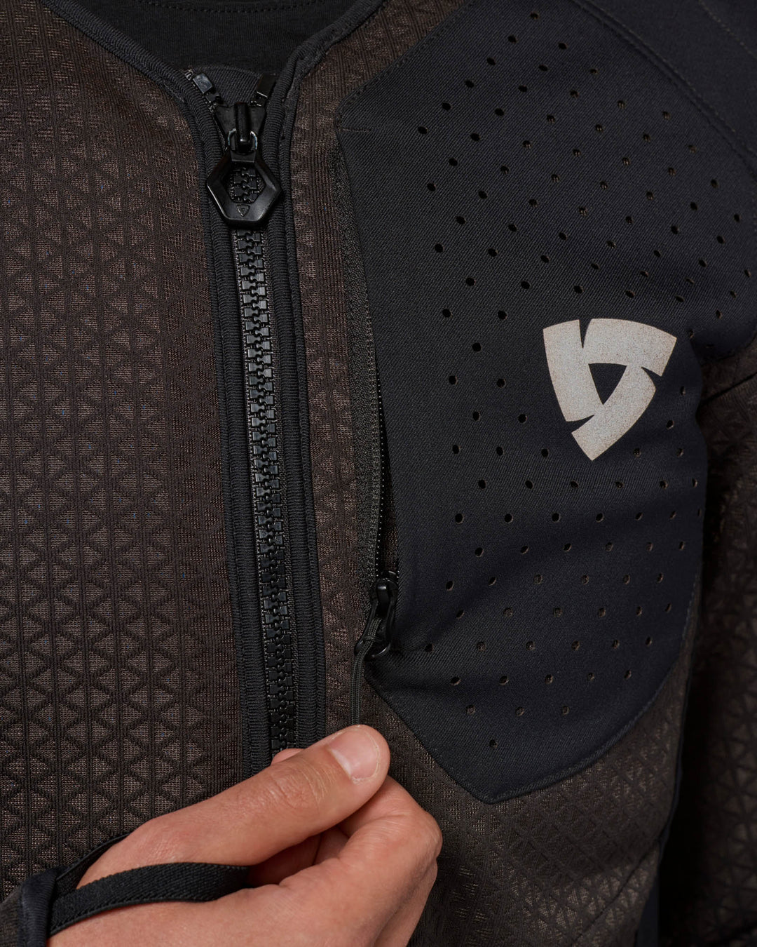 Close-up of logo on REV’IT! Nucleus Protector Jacket