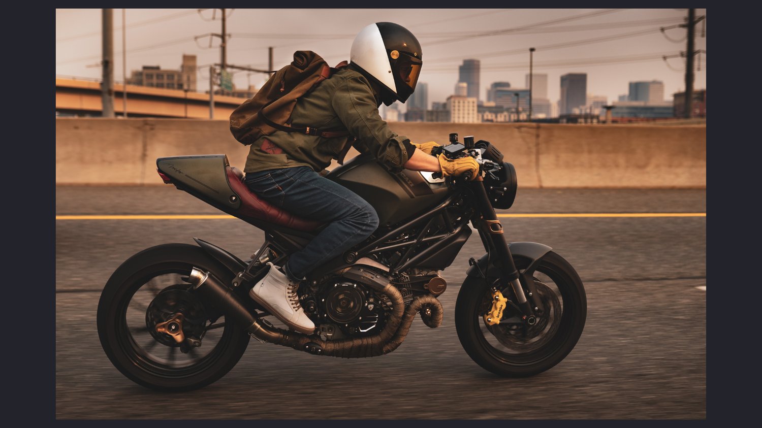 rider-wearing-john-doe-moto-shirt-olive-hedon-two-faced-helmet-yellow-leather-protective-motorcycle-gloves-motorcycle-back-pack-neo-motorcycle-boots-white