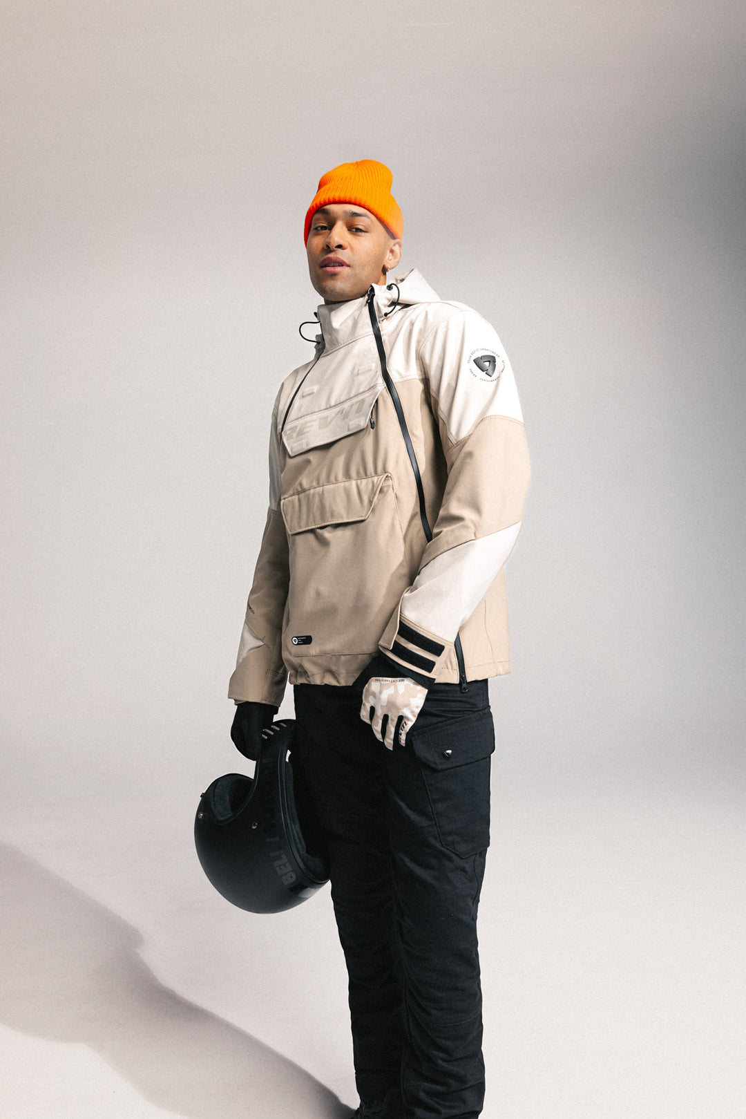 Model wearing REV’IT! Altair H2O Smock, Sand left three- quarter view