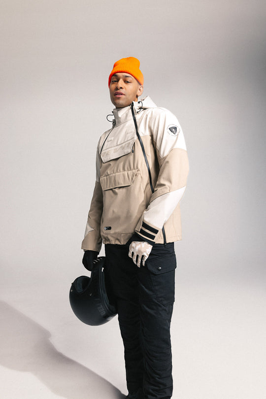 Model wearing REV’IT! Altair H2O Smock, Sand left three- quarter view