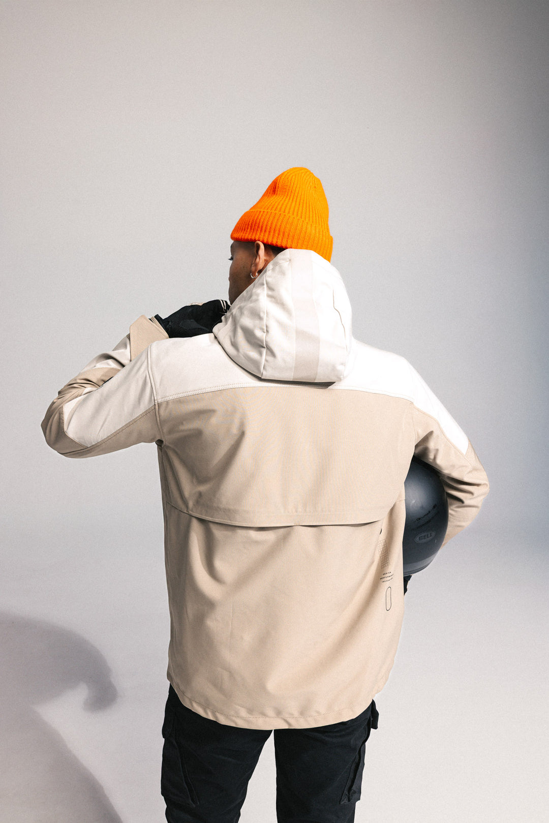 Model wearing REV’IT! Altair H2O Smock, Sand rear view