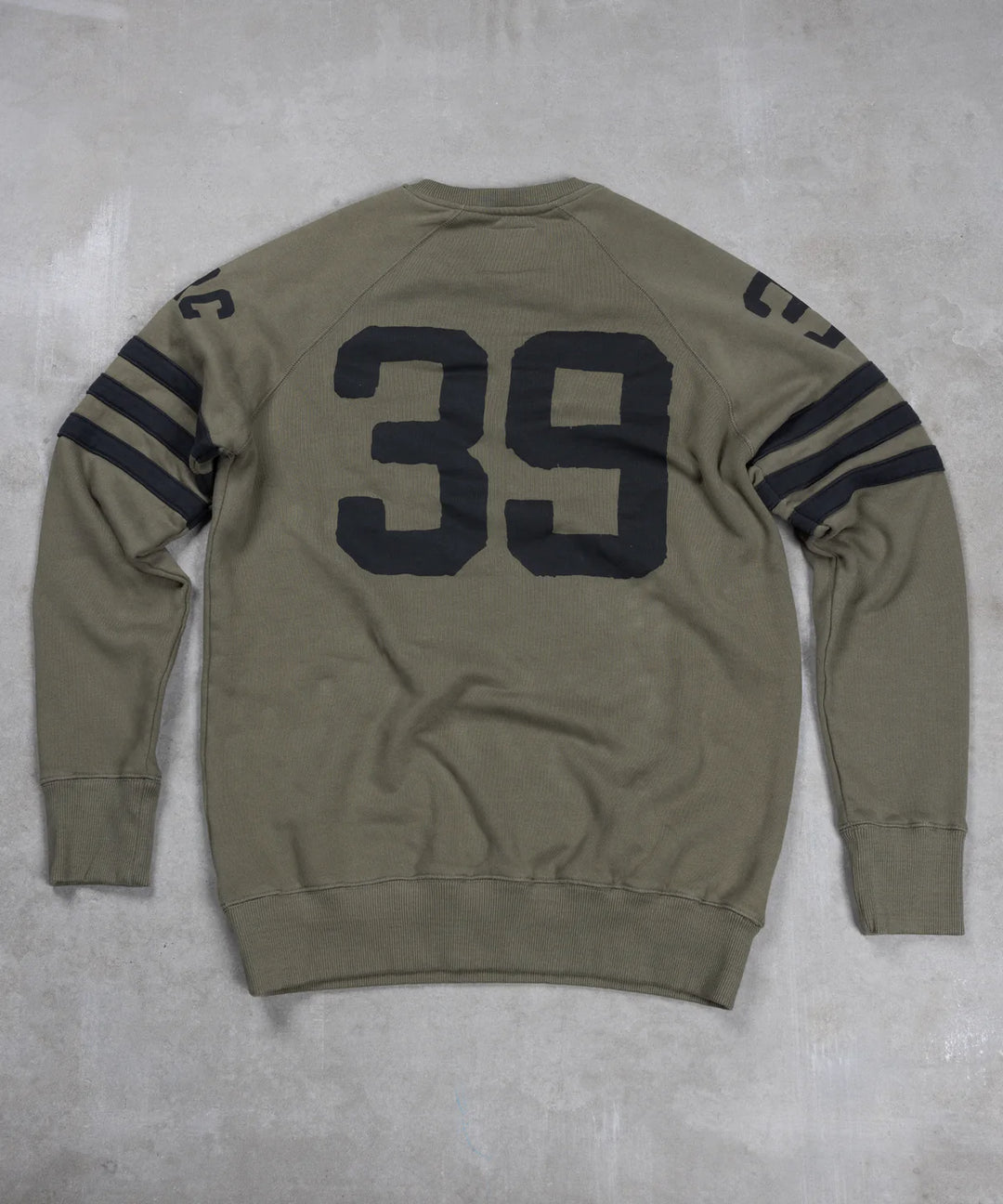 Maria-riding-spades-sweatshirt-army-green-back