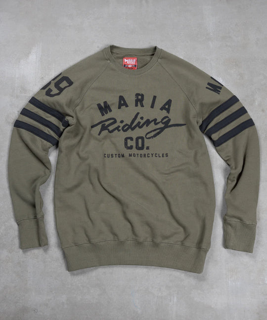 Maria-riding-spades-sweatshirt-army-green-front