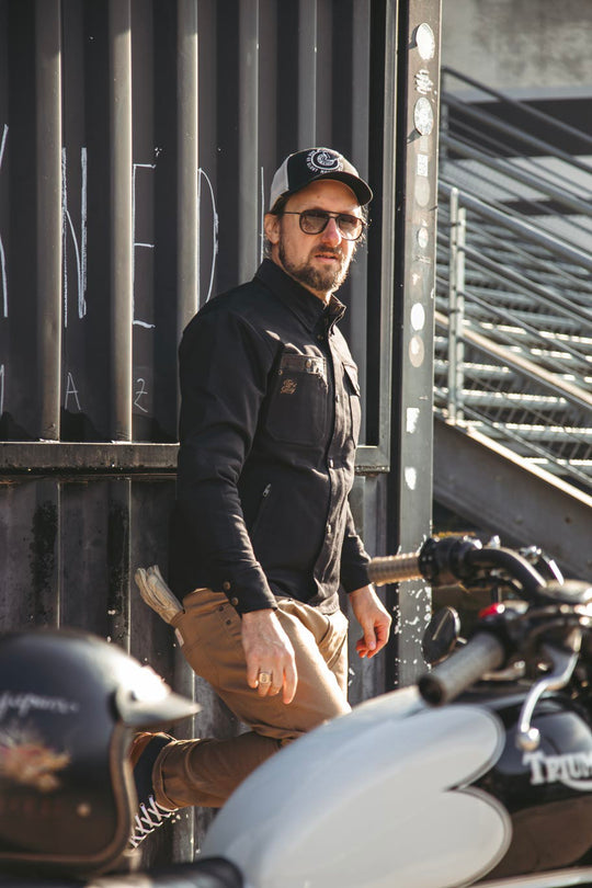 Model Wearing Age of Glory Runaway Riding Shirt in Black – 3/4 View, Jacket closed, Cord Collar