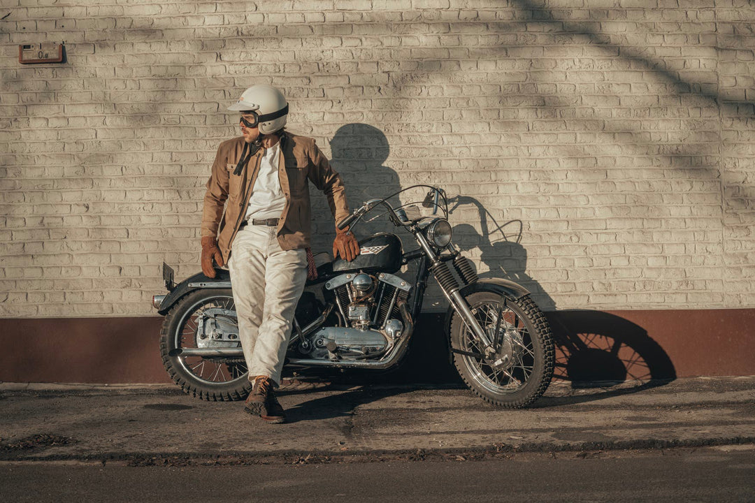 Age of Glory Runaway Riding Shirt in Desert Khaki – Rider With Motorcycle, against wall