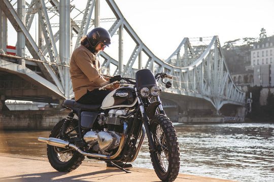 Age of Glory Runaway Riding Shirt in Desert Khaki – Rider with Motorcycle, by bridge and river