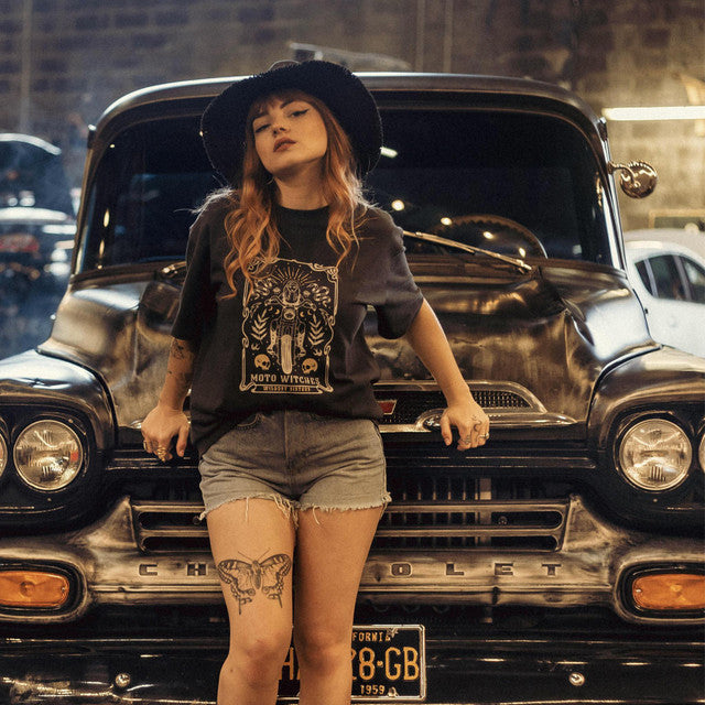 Close-up of Wildust Sisters Moto Witches T-Shirt showing detailed mystical motorcycle graphic