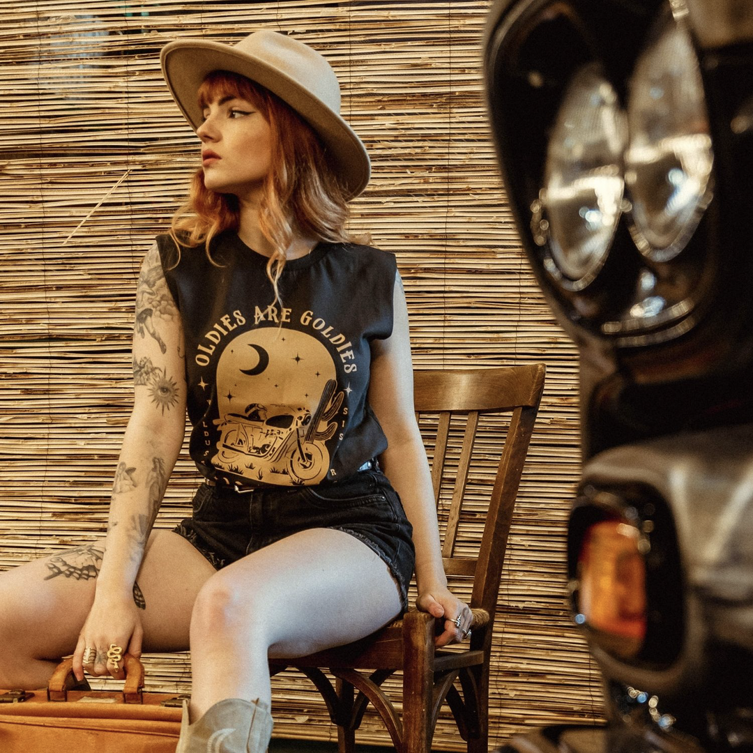 model-wearing-wildust-oldies-tank-camel-print-black-front