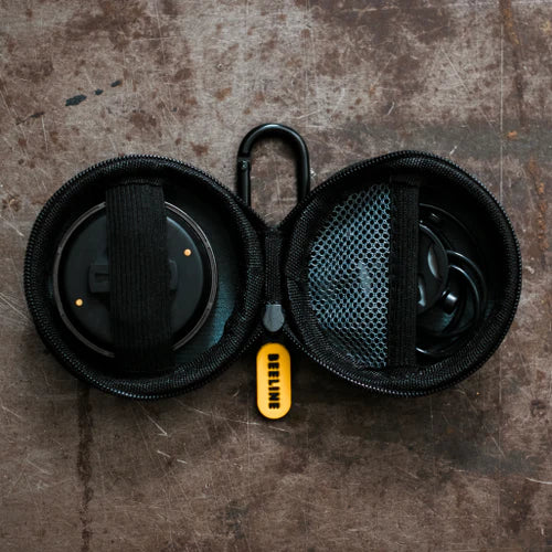 Beeline Moto II Carry Case open showing device secured with strap and charging cable in mesh pouch