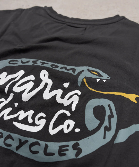 maria-riding-dark-grey-veneno-t-shirt-close-up-reverse-print