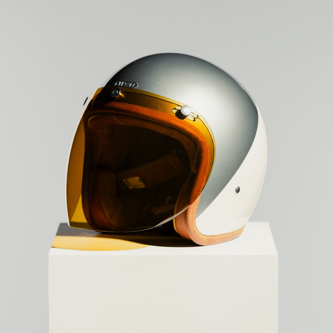 Hedon Hedonist Camelot open-face motorcycle helmet front three-quarter view fitted with optional amber shield visor