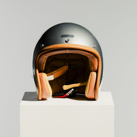 Hedon Hedonist Camelot open-face motorcycle helmet front view showing leather trim and suede interior