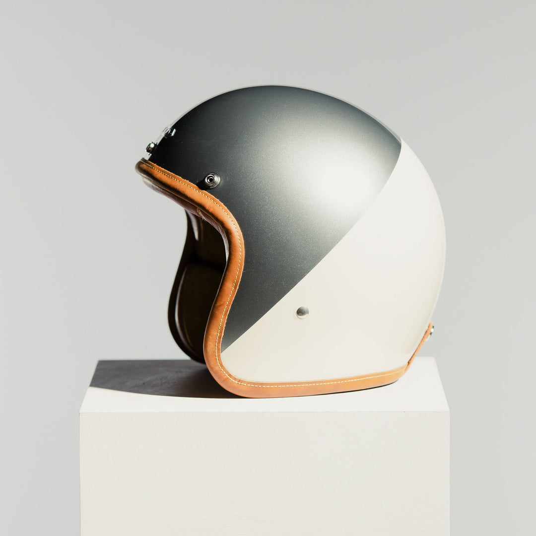 Hedon Hedonist Camelot open-face motorcycle helmet side profile showing champagne silver, cream finish and leather trim