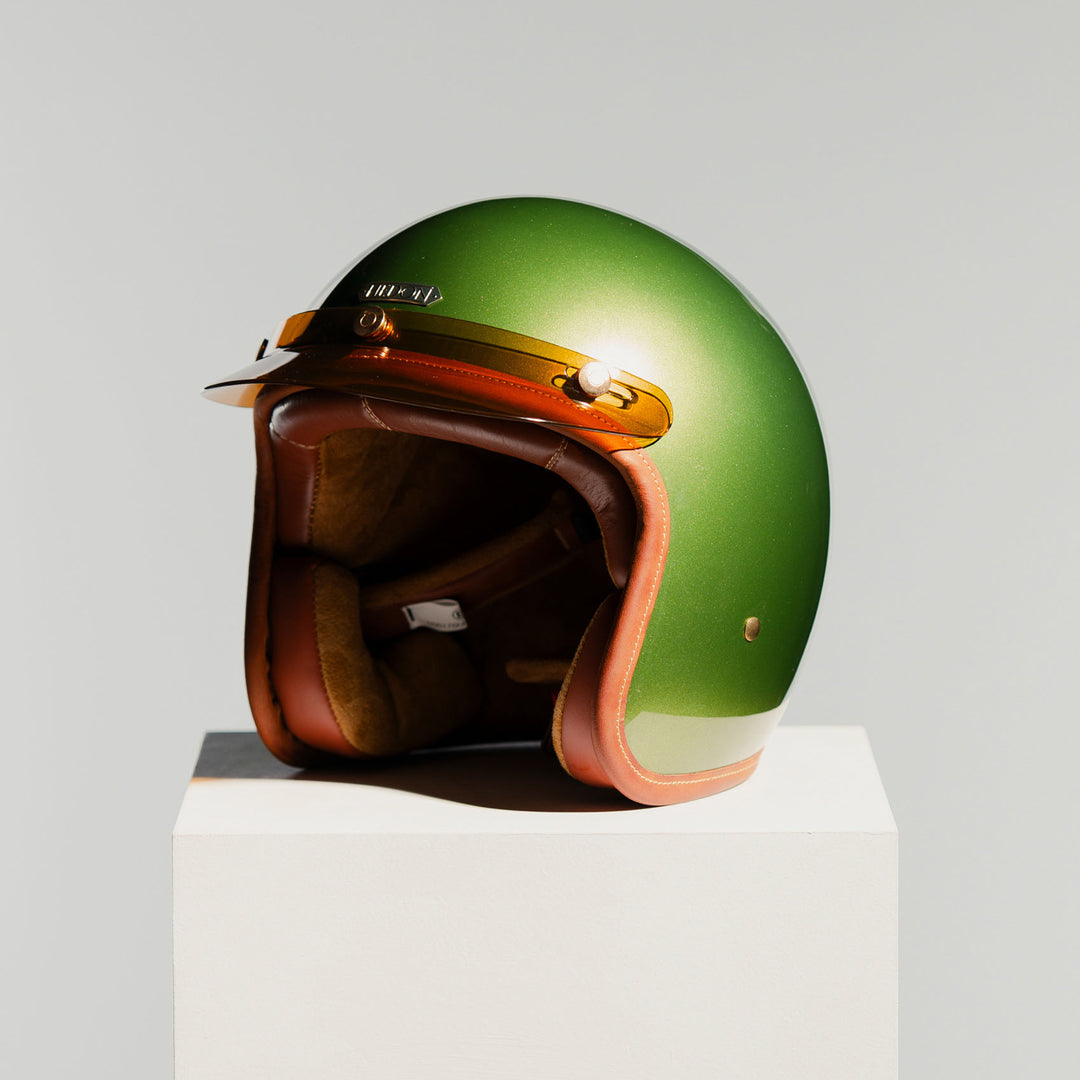 Front left side view on Hedon Hedonist Helmet - Olivea with peak 