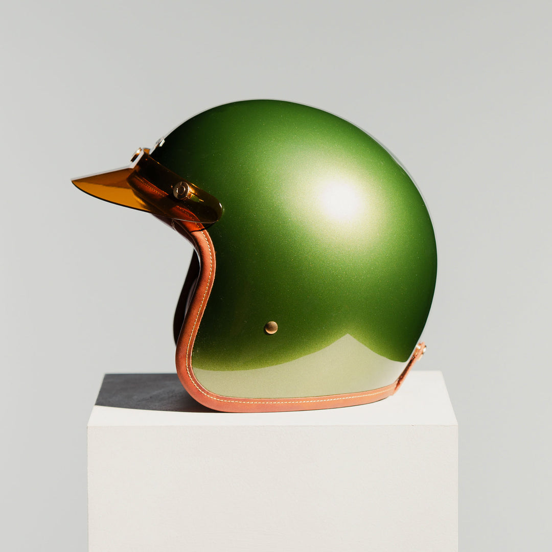 Left side view of Hedon Hedonist Helmet - Olivea with peak 