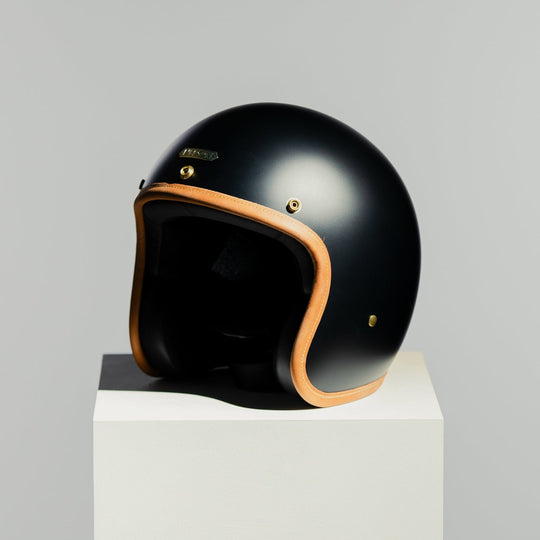 Front left side view of Hedon Hedonist Helmet - Stable Black 