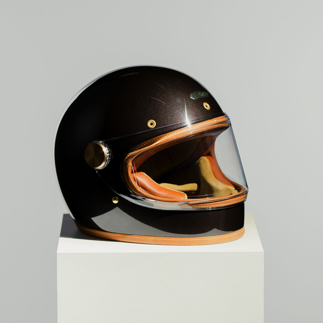 Front right side view of Hedon Heroine Racer 2.0 Helmet - Macadamia with clear visor closed 