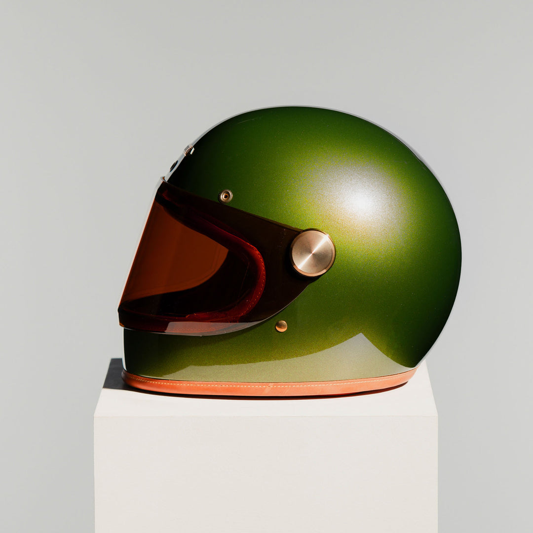Left side view of Hedon Heroine Racer 2.0 Helmet - Olivea with tinted visor closed