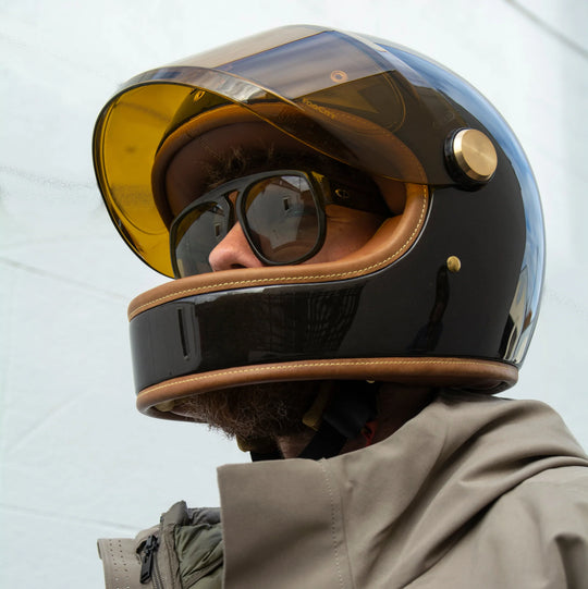 Front left view of model wearing Hedon Heroine Racer 2.0 Helmet - Macadamia 