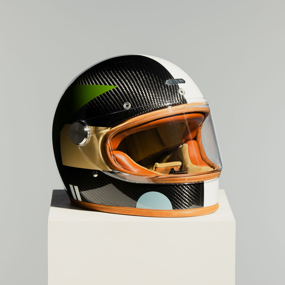 Left three-quarter front view of the Hedon Heroine Racer 2.0 Helmet – Bauhaus with clear visor closed.