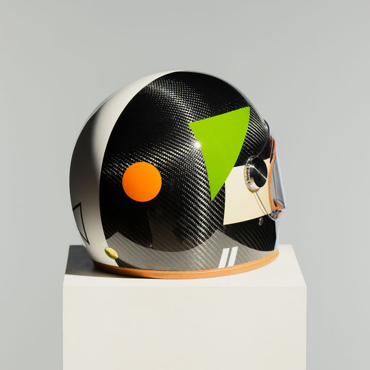 Left rear three-quarter view of the Hedon Heroine Racer 2.0 Helmet – Bauhaus with clear visor closed