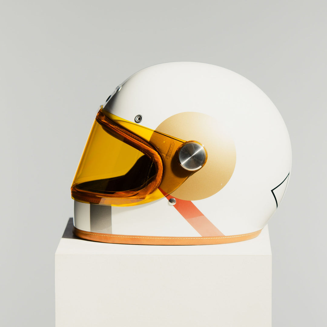 Left side view of Hedon Heroine Racer 2.0 Helmet - Bauhaus with tinted visor closed