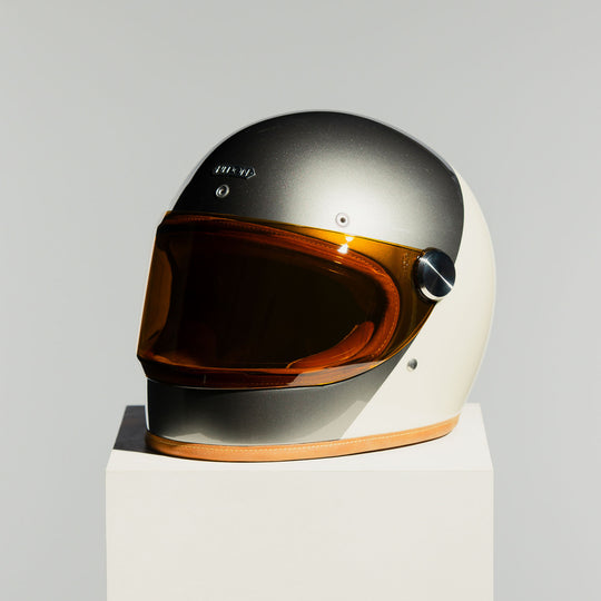 Front left side view of the Hedon Heroine Racer 2.0 Helmet – Camelot with the tinted visor closed