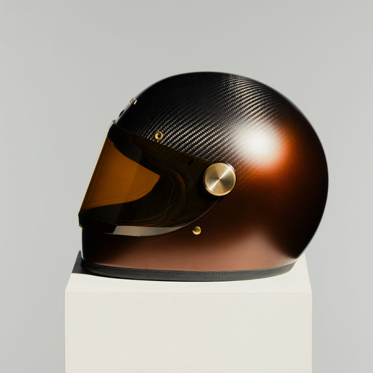 Left-side view of the Hedon Heroine Racer 2.0 Helmet – Eemes with the tinted visor closed