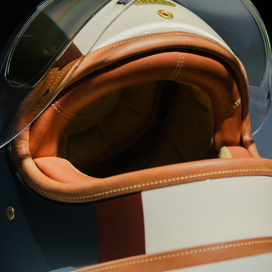 Angled three-quater view of Hedon Heroine Racrer Helmet - Eastwood with clear visor open 