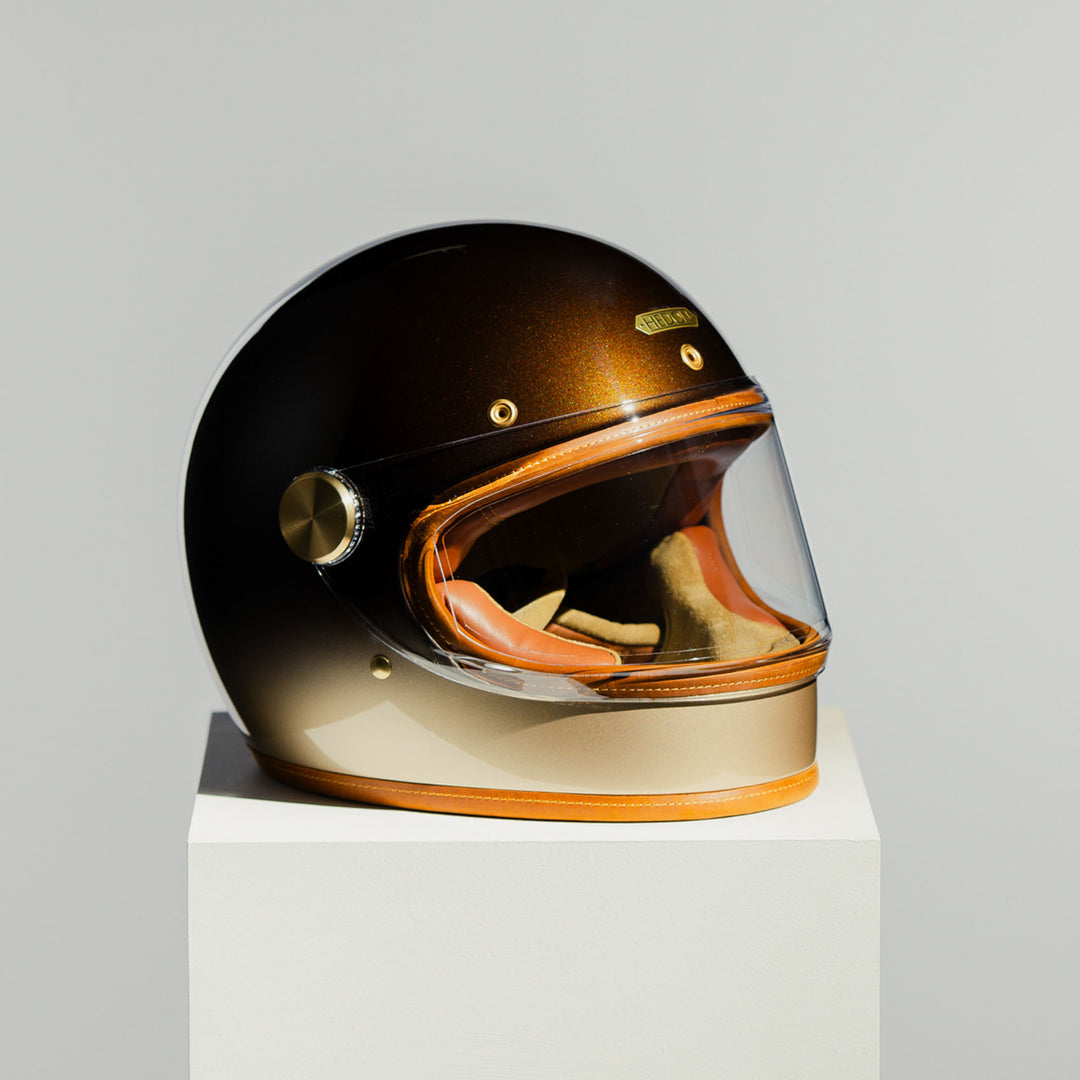 Front right side view of Hedon Heroine Racer Helmet - Polvo with clear visor closed