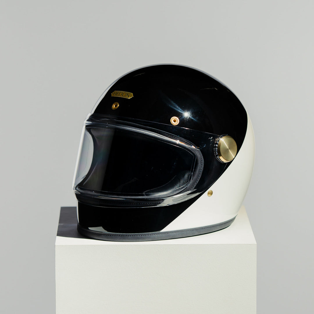 Front left view of Hedon Heroine Racer 2.0 Helmet - Two Face with clear visor down 