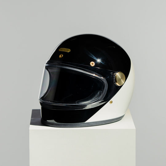 Front left view of Hedon Heroine Racer 2.0 Helmet - Two Face with clear visor down 