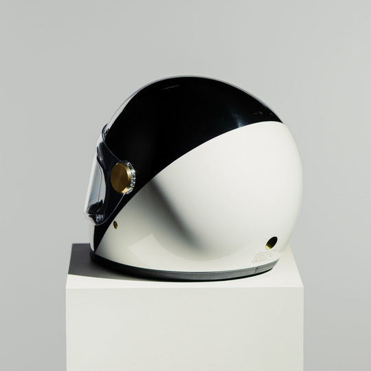 Rear left view of Hedon Heroine Racer 2.0 Helmet - Two Face with clear visor down 