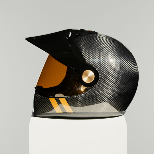 Left side view of the Hedon Psilo Explorer Helmet – Commander with the tinted visor closed