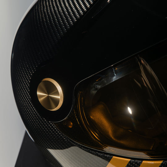Close-up of the visor mechanism on the Hedon Psilo Explorer Helmet – Commander with the tinted visor closed