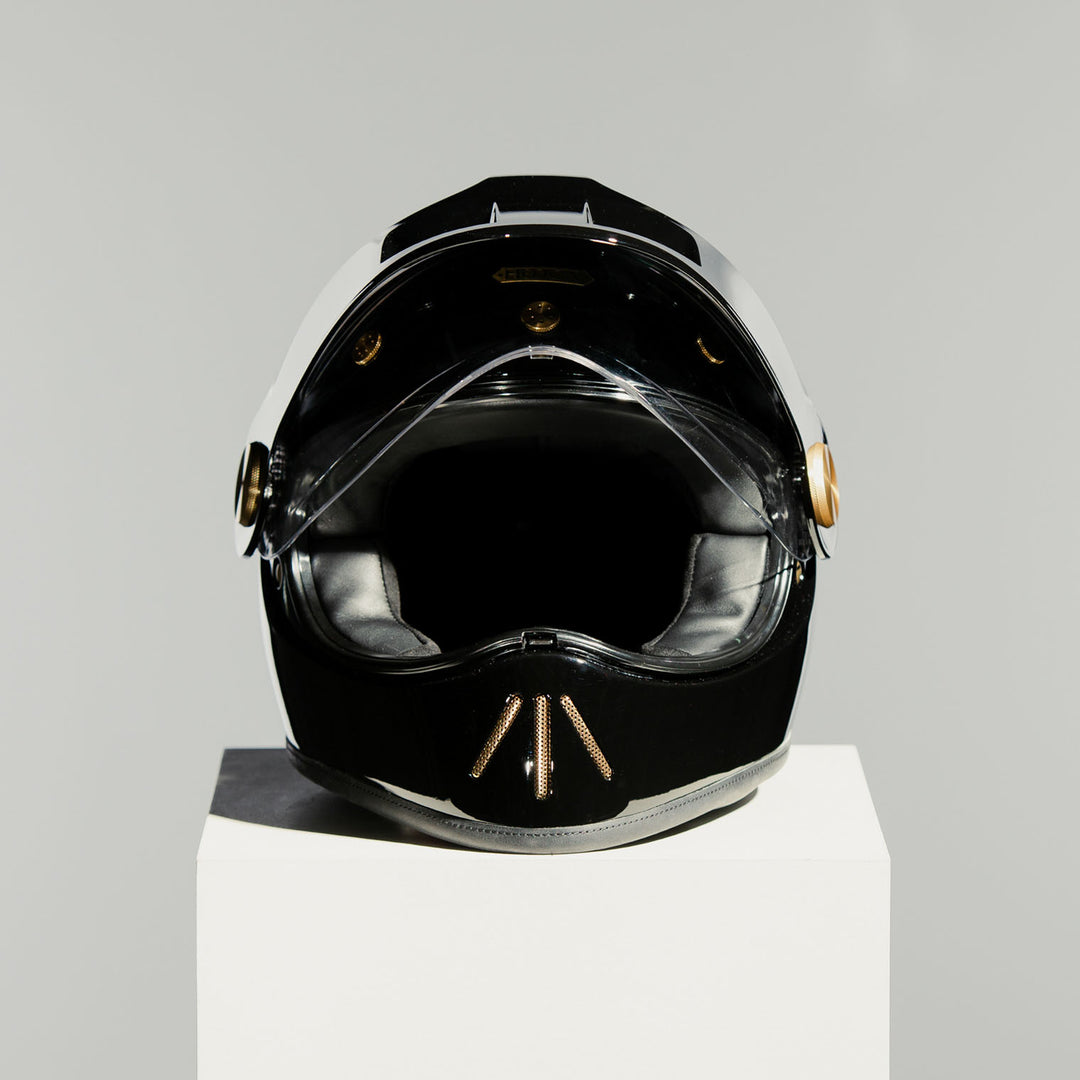 Front view of Hedon Psilo Explorer Helmet - Signature Black with clear visor open 