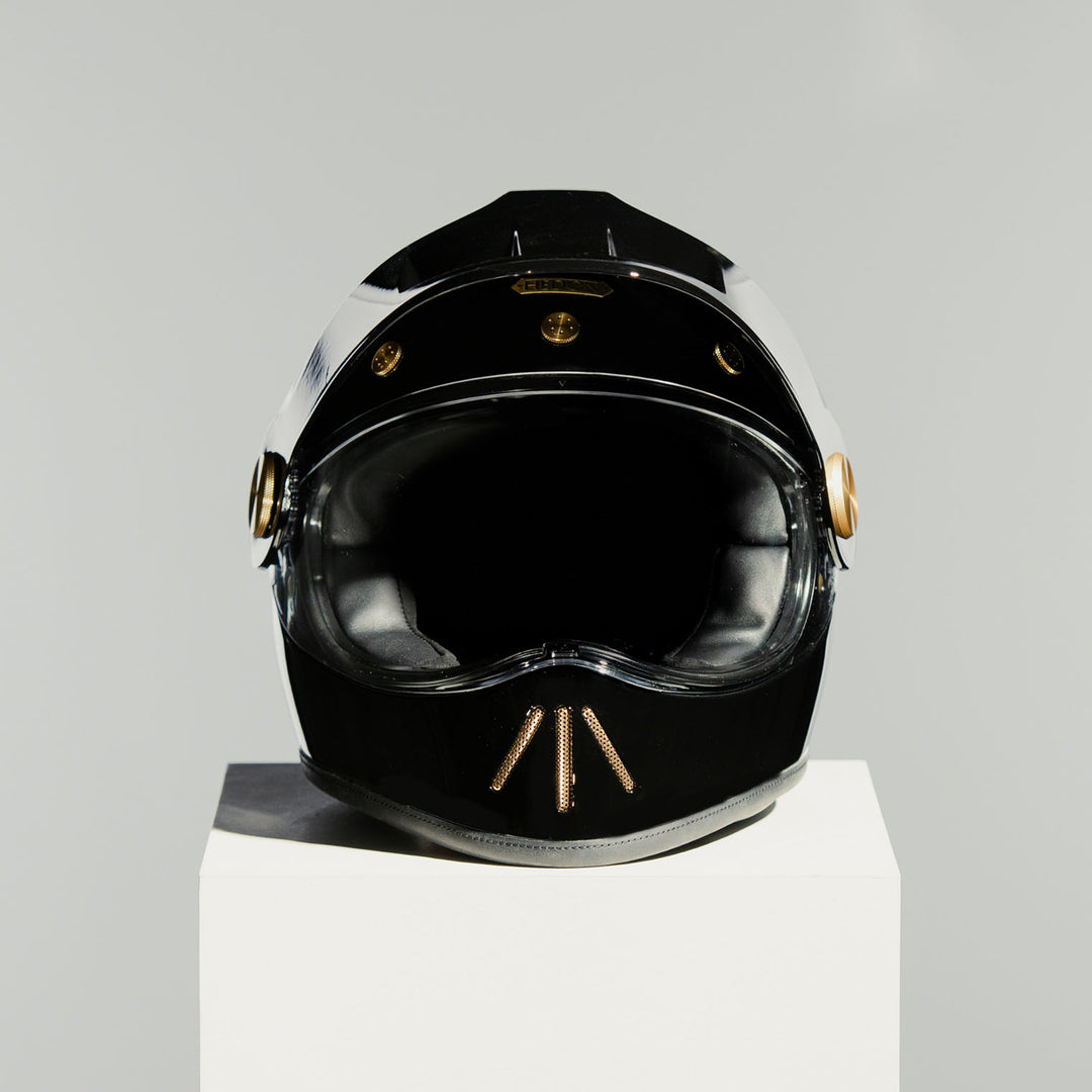Front view of Hedon Psilo Explorer Helmet - Signature Black with clear visor down 